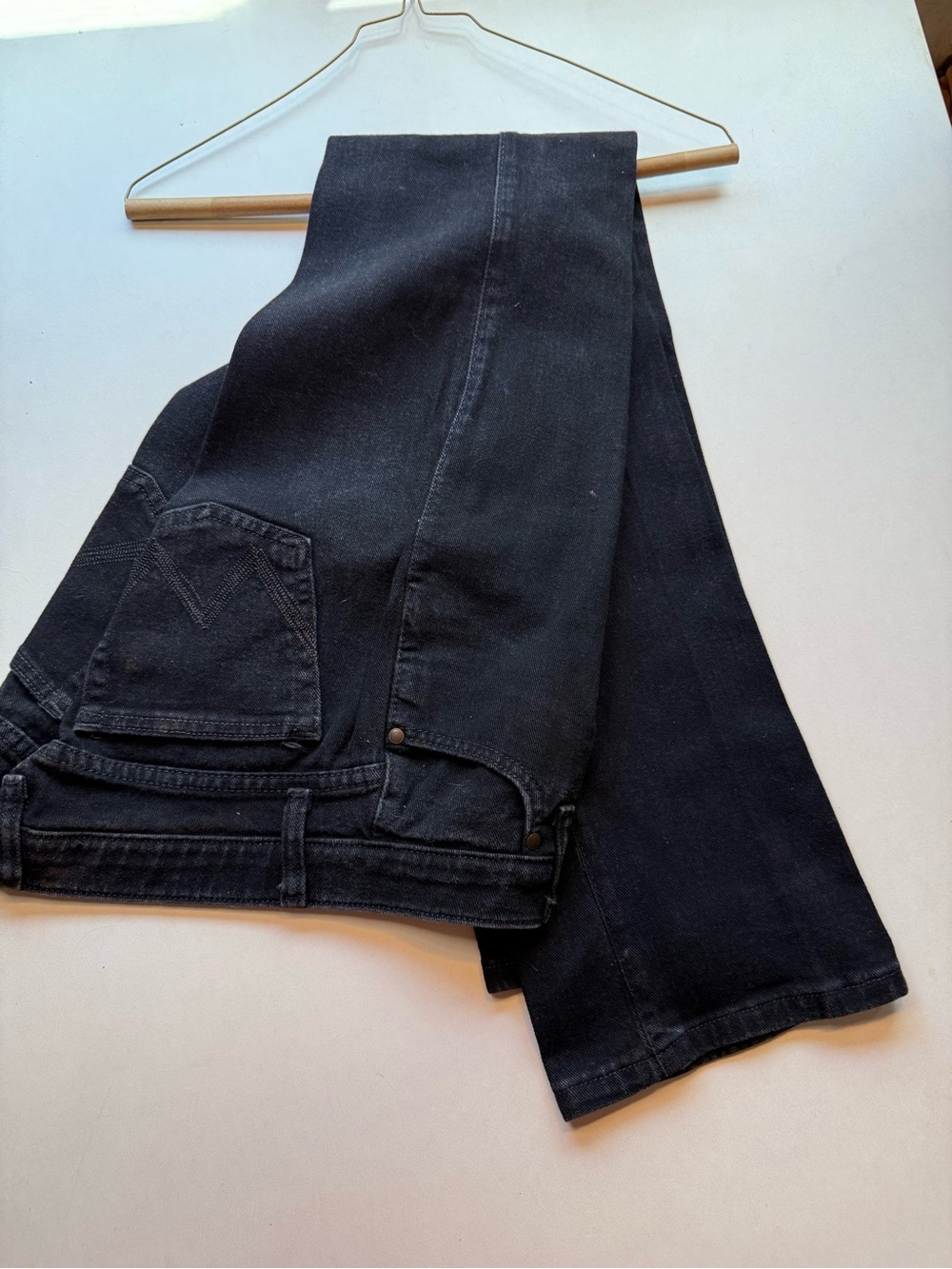 Women’s black Wrangler 3/4 x 34
